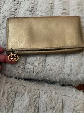 Gucci Metallic Gold Continental Wallet with GG Charm Pendant